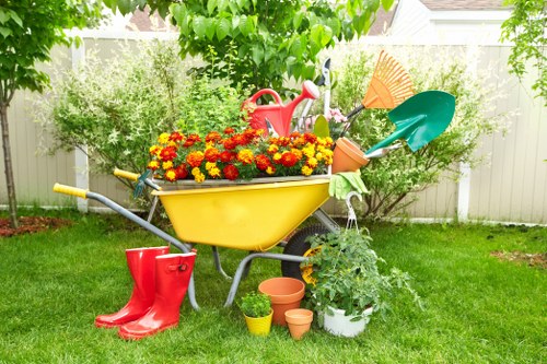 Gardener preparing tools in a Neasden garden
