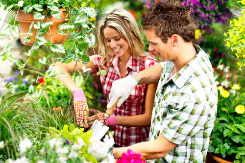 Supervisor inspecting a garden during complaint investigation